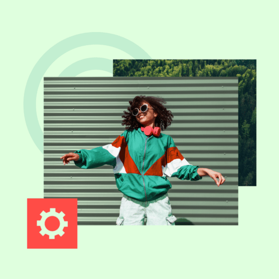 A person dances in an alley.
