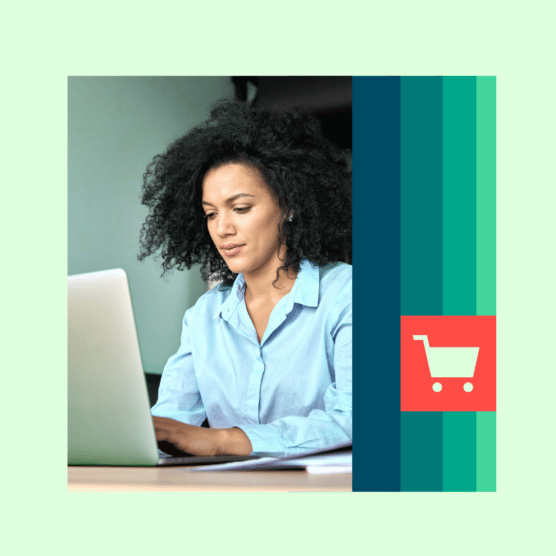 A woman concentrates while looking at a laptop.