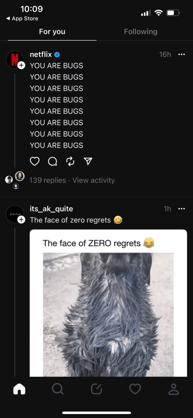 The For You tab is controlled by the Threads algorithm. In this example, a post from the official Netflix account is followed by one from an account the user doesn't follow.